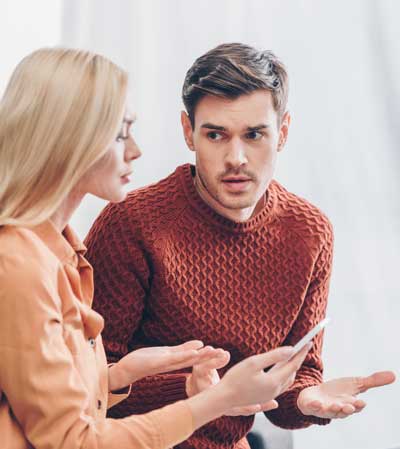 Woman showing the signs of adultery that she found on spouse phone.