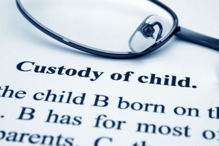 Child custody cases document with glasses