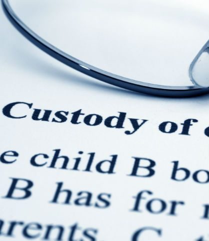 Child custody cases document with glasses